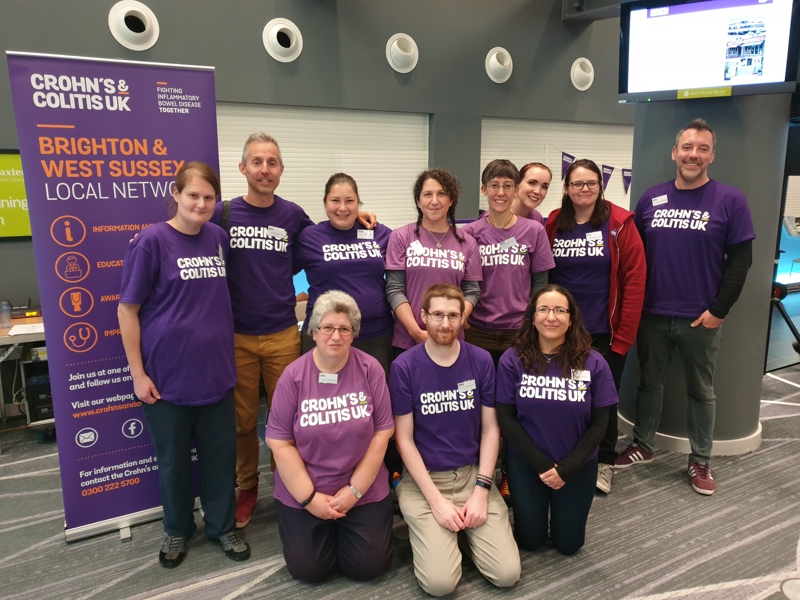 People in Crohn's and Colitis UK t-shirts posing for a photo