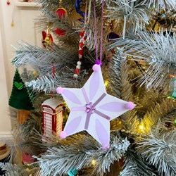 Finished star hanging on Christmas tree.