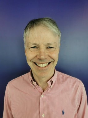 Portrait photo of a man smiling