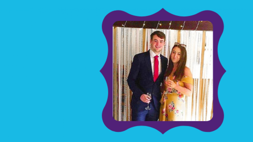 Couple cuddling drinking champagne