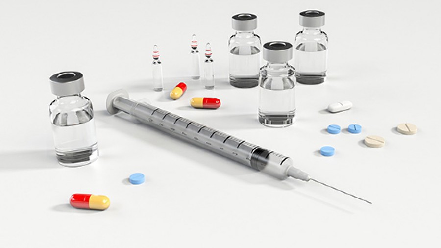 Syringe, medicines and tablets