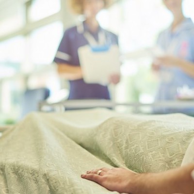 Patient in hospital bed