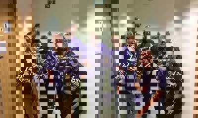 Crohn's & Colitis UK supporters wearing purple t-shirts