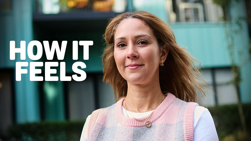 Woman smiling outdoors with text reading "HOW IT FEELS"