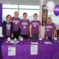 Crohn's & Colitis UK supporters wearing purple t-shirts
