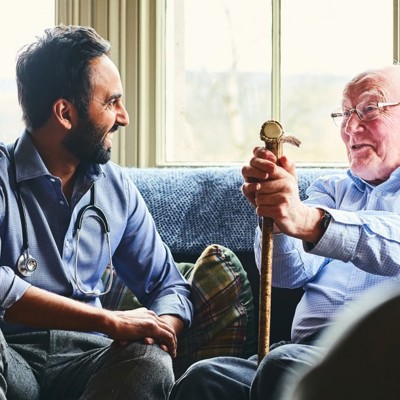 patient and doctor smiling