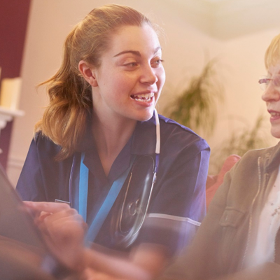 Patient talking with nurse
