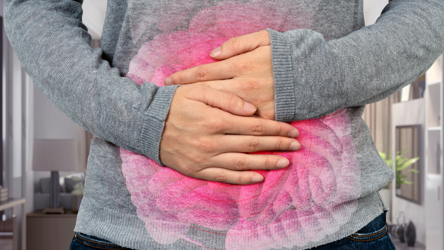 Person holding their stomach